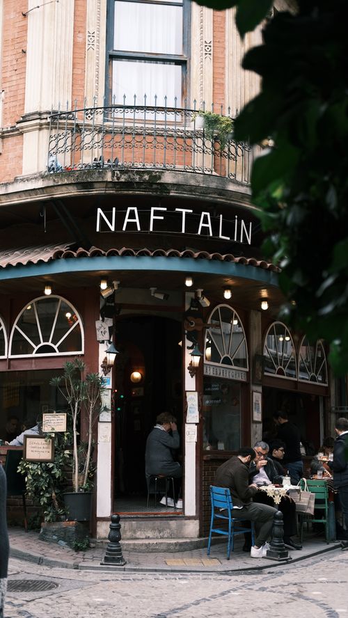 Free Explore a cozy street corner café in Istanbul, capturing urban charm and local culture. Stock Photo