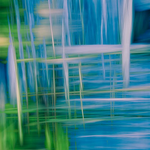 Abstract painting of a green and blue background
