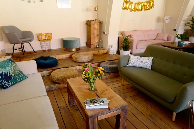 A beautifully furnished living room with a sofa and coffee table
