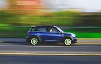 Blue Suv on Road