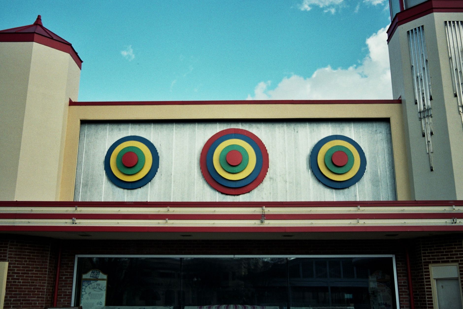 Colorful Art Deco building facade with geometric designs at Glen Echo Park, Maryland.