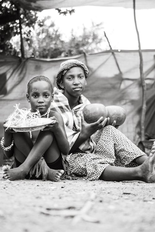 Afrikalı kadın, çocuk, dikey atış içeren Ücretsiz stok fotoğraf