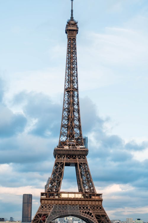 Eiffel Tower Standing against the Sky at Dusk