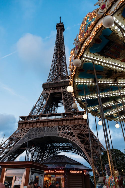 The eiffel tower and a carousel in paris