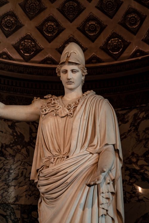 Free Intricate marble sculpture of Athena inside the Louvre Museum, Paris. Stock Photo