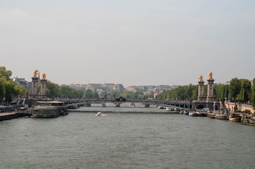 Free View of Pont Alexandre III bridge and Seine River in Paris, France. Stock Photo