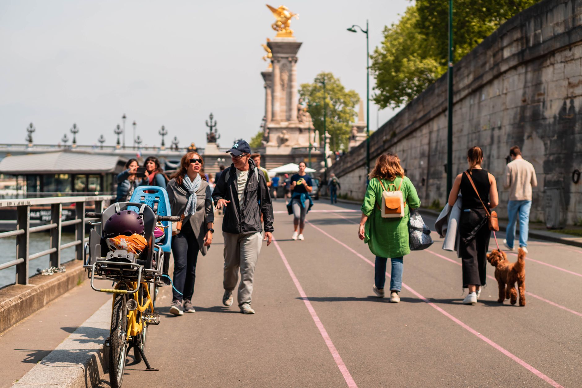 People sitting along the banks of the Canal Saint-Martin, Paris