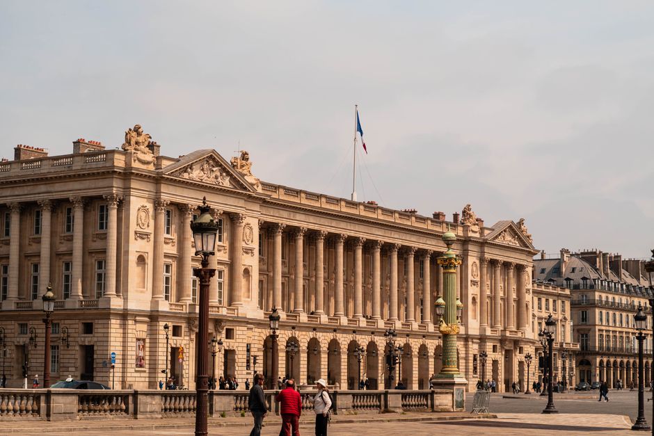 Grand architecture of Hôtel de la Marine in Paris under a clear sky, perfect for travel and history enthusiasts.