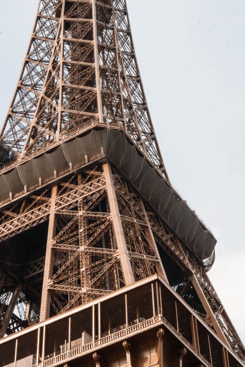 Free Detailed view of the Eiffel Tower showcasing its intricate steel framework in Paris, France. Stock Photo