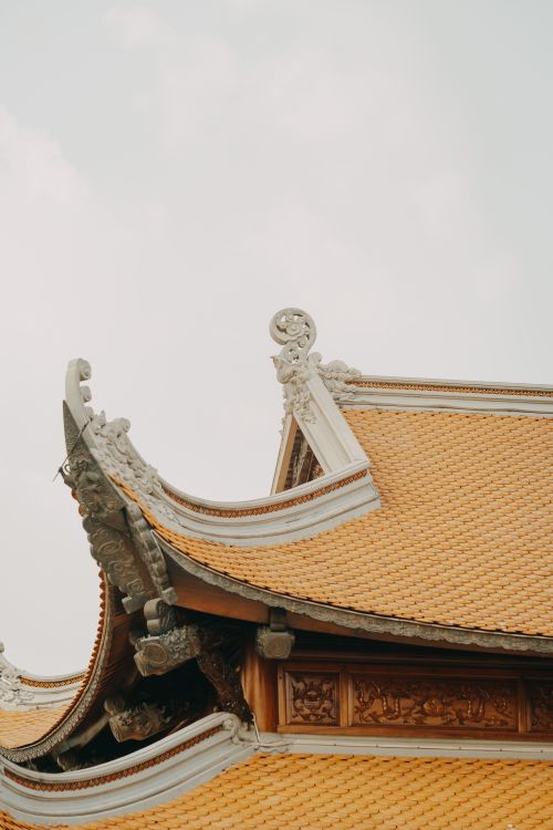 Free Close-up of an ornate pagoda roof showcasing traditional Asian architectural details and craftsmanship. Stock Photo
