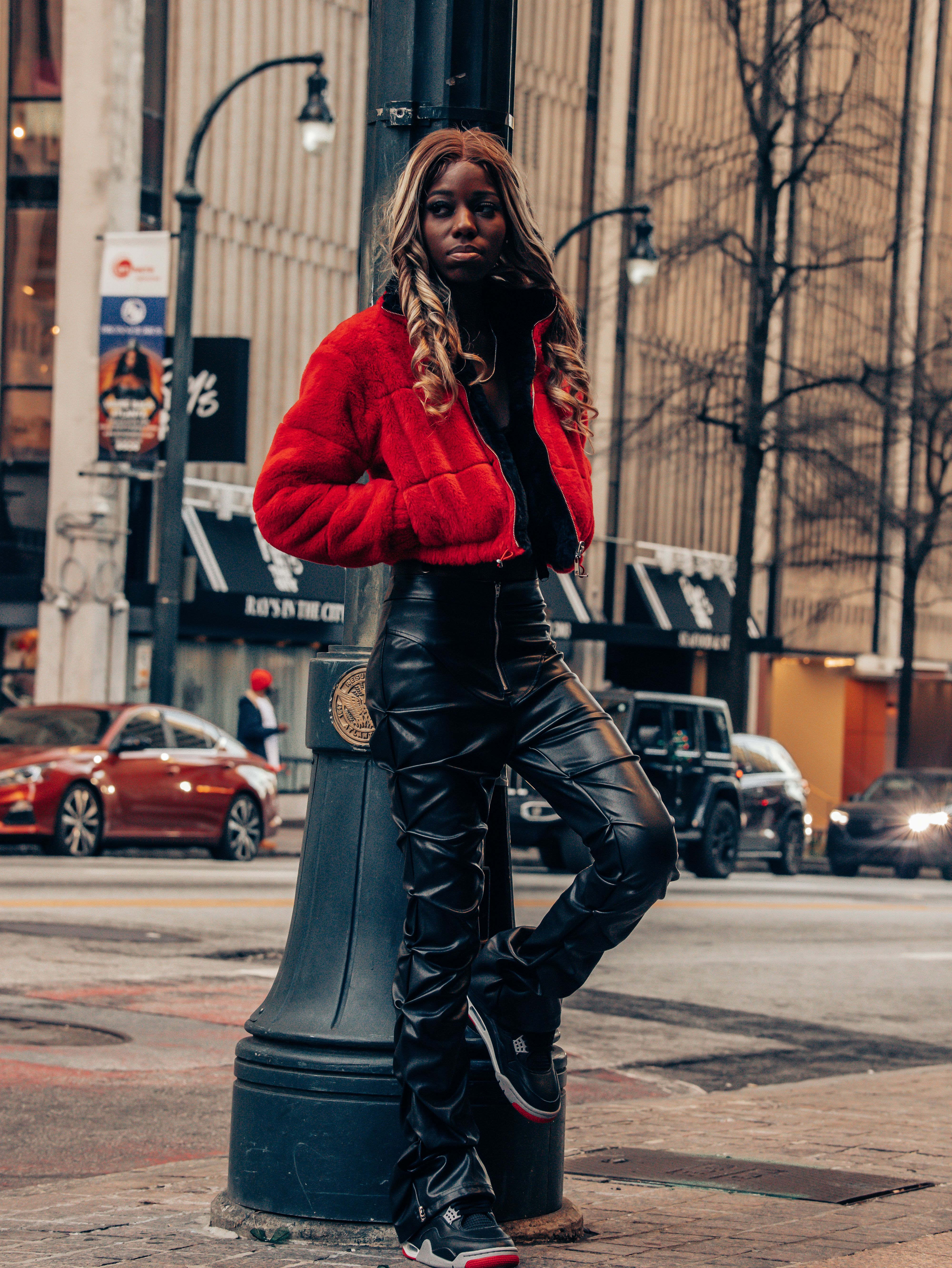 Fringe leather jacket with red mini skirt 80s outfit