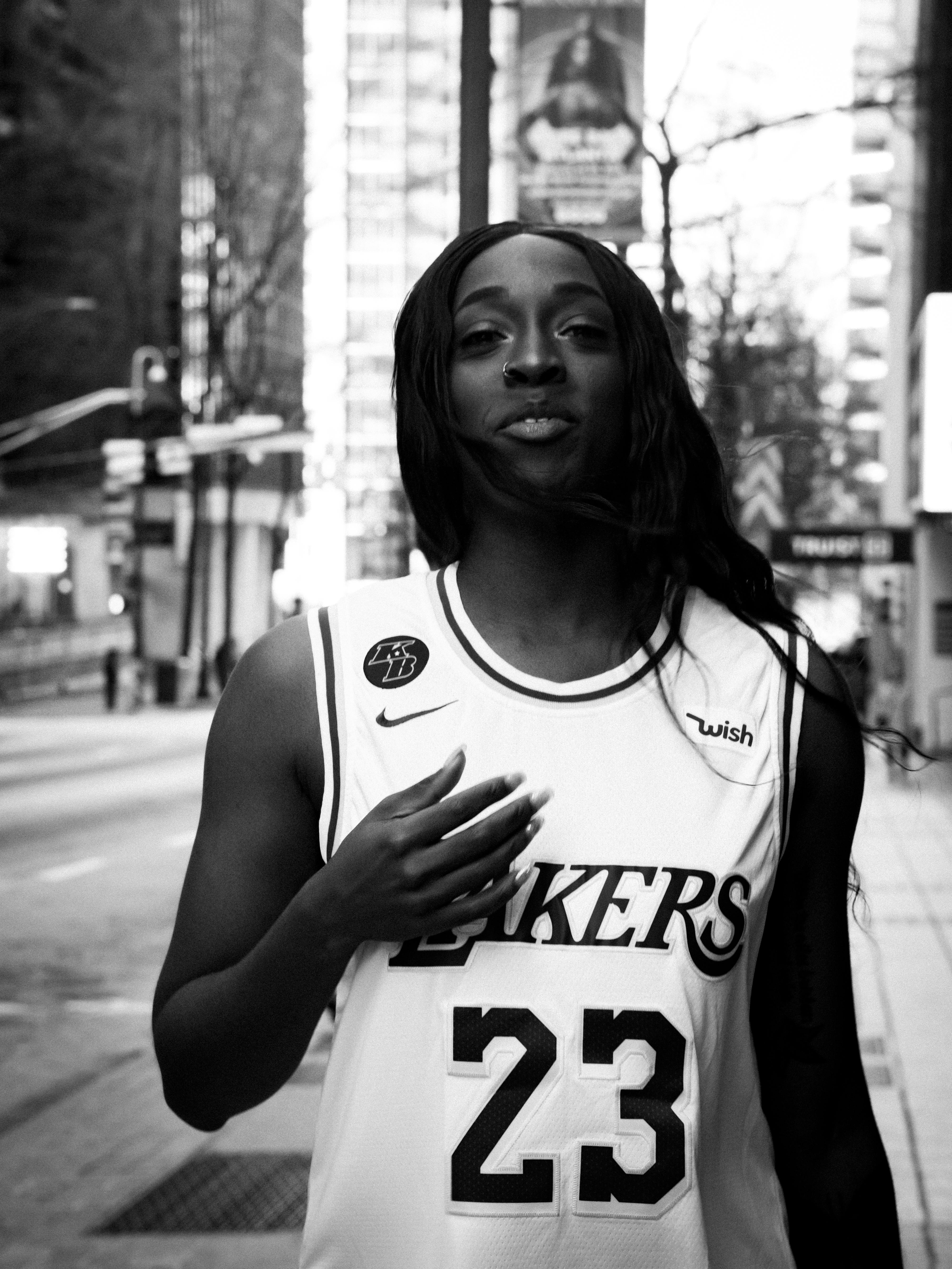 beautiful black fashion model wearing basketball jersey