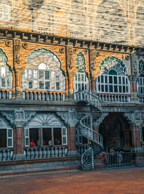 The building has a spiral staircase and a balcony