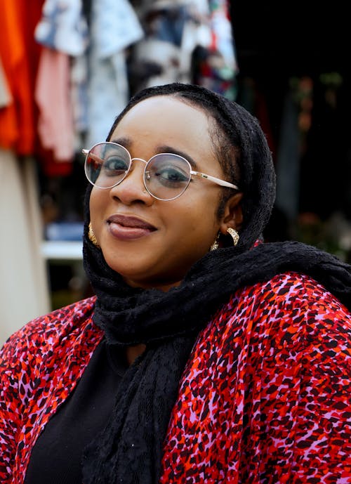 Smiling Woman in Scarf and Eyeglasses