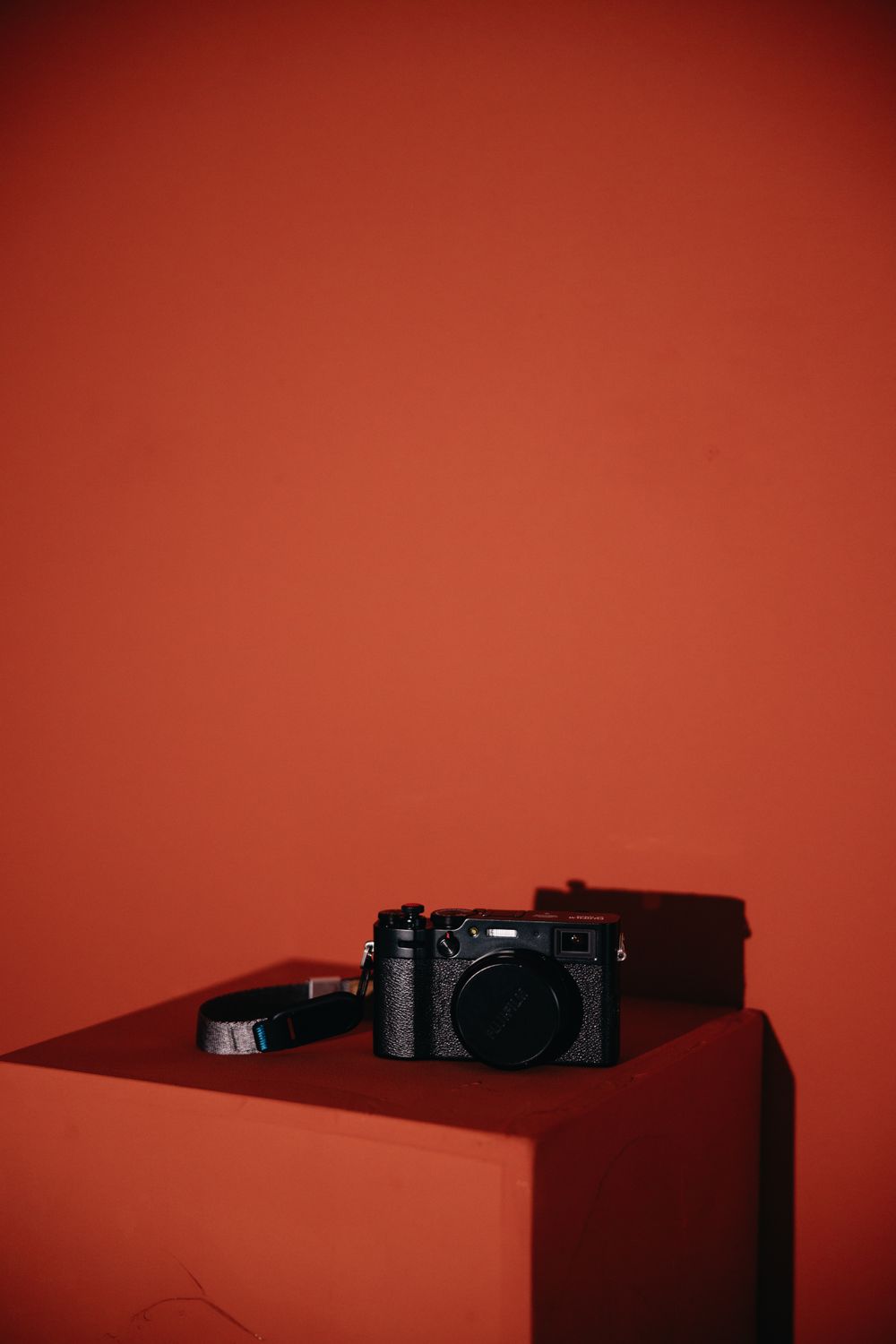 Camera in Red Background · Free Stock Photo