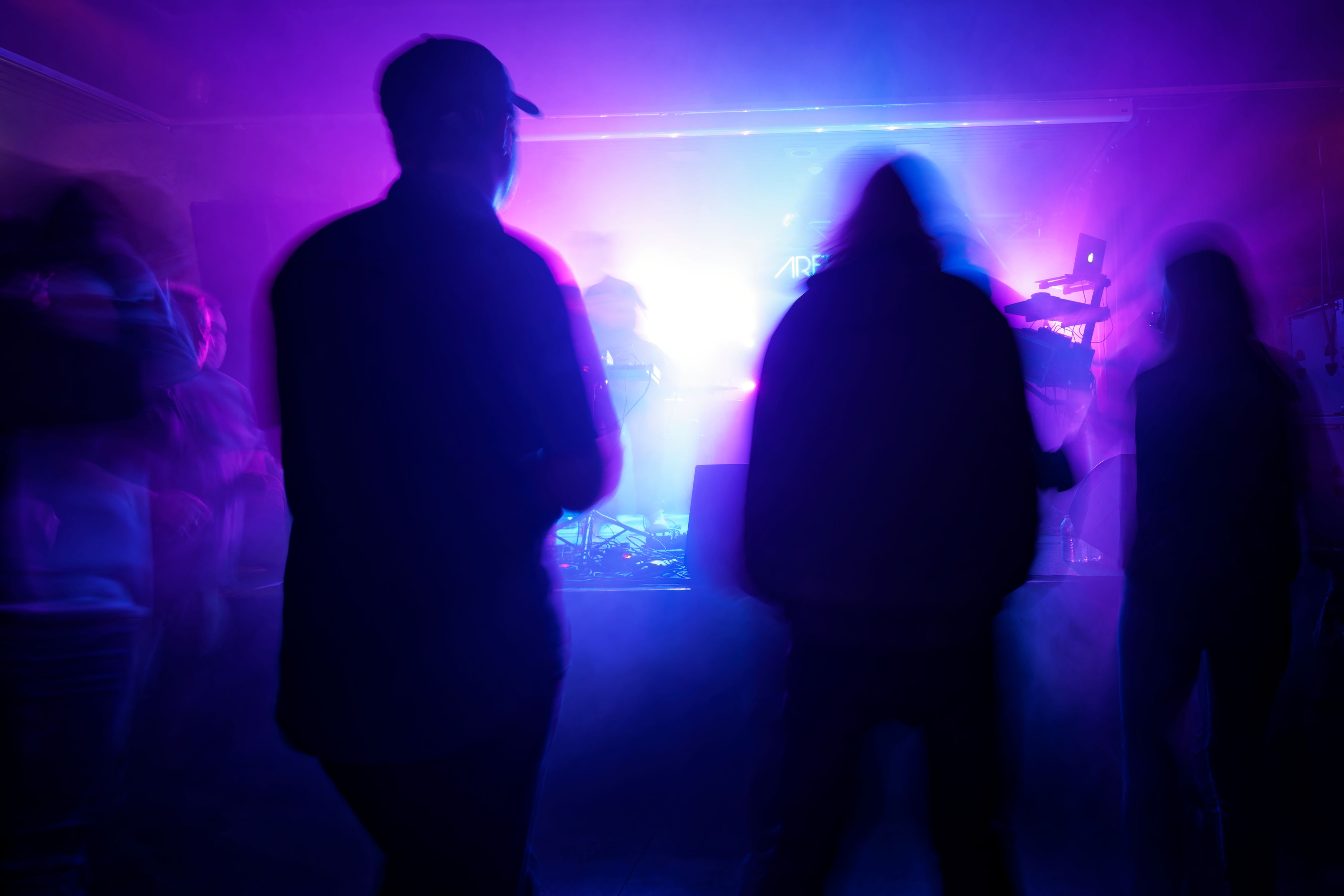Partygoers on the dance floor under dramatic purple lighting at Old Soul Maroochydore