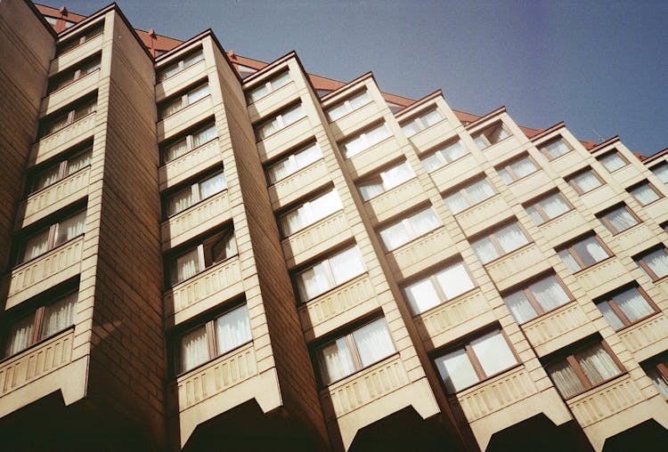 Low Angle Shot Of A Block Of Flats In Sunlight 