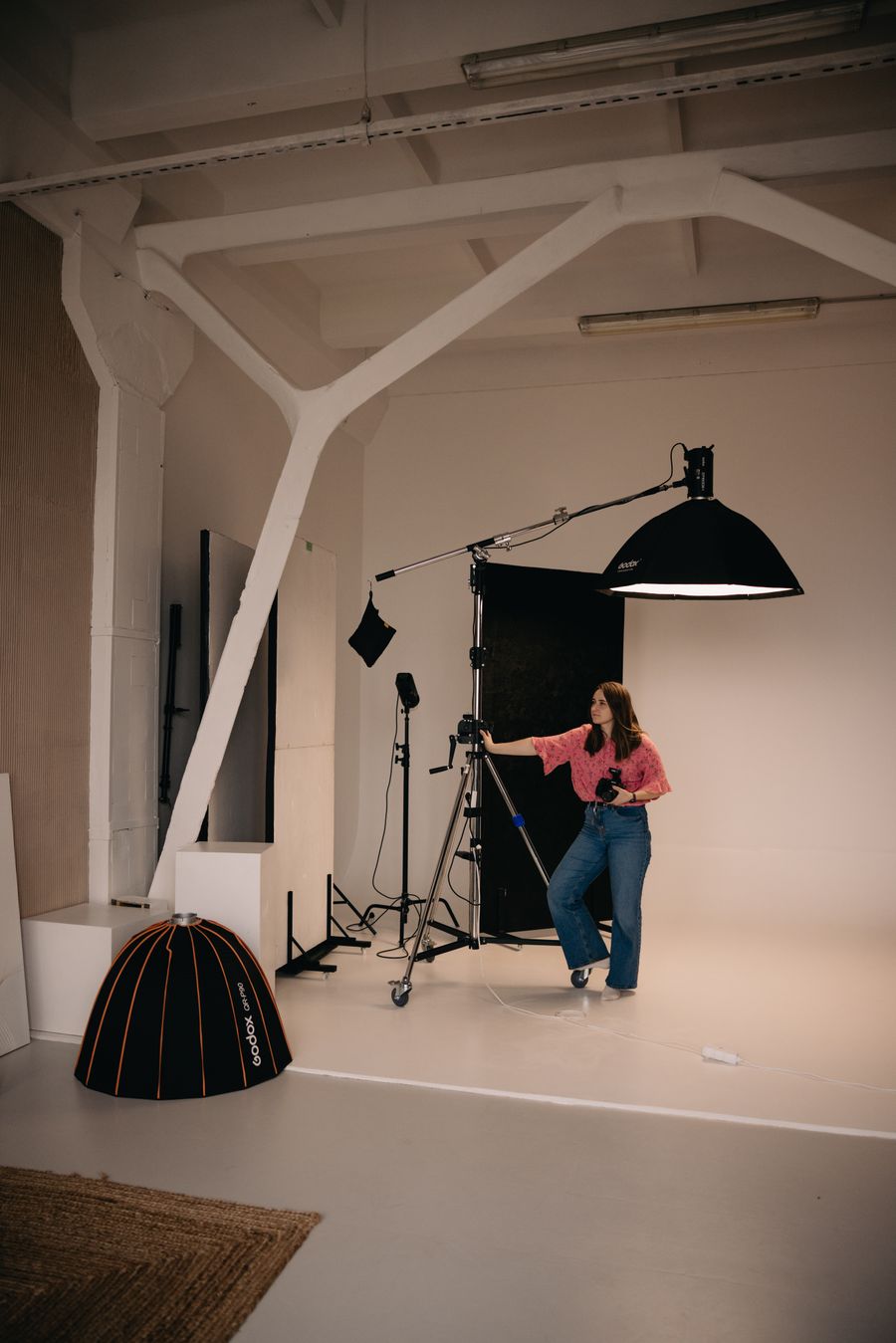 Female photographer working in a studio