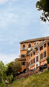 A picturesque hillside view of historic Italian architecture in Rome, Italy.