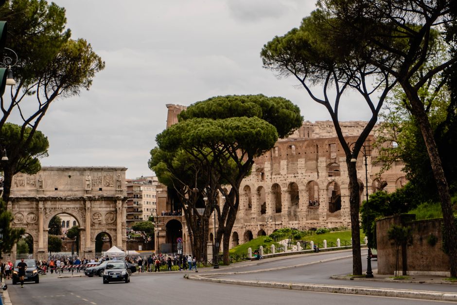 An International Driving Permit (IDP) next to an Italian map, essential for driving in Rome for non-EU citizens.