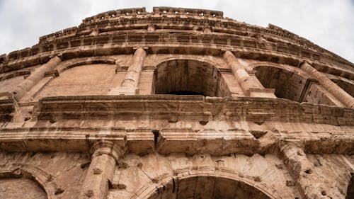 Low Angle Shot of Colosseum Wall