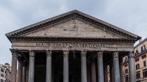 Free Front view of the ancient Pantheon in Rome, showcasing its iconic columns and historic architecture. Stock Photo