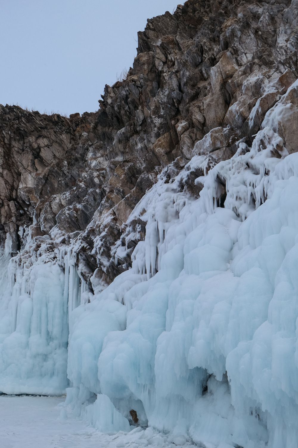Ice In Rocks Rock Wall Covered in Ice · Free Stock Photo