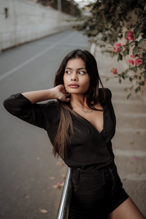 Portrait of a Long-Haired Brunette Wearing a Black Shirt