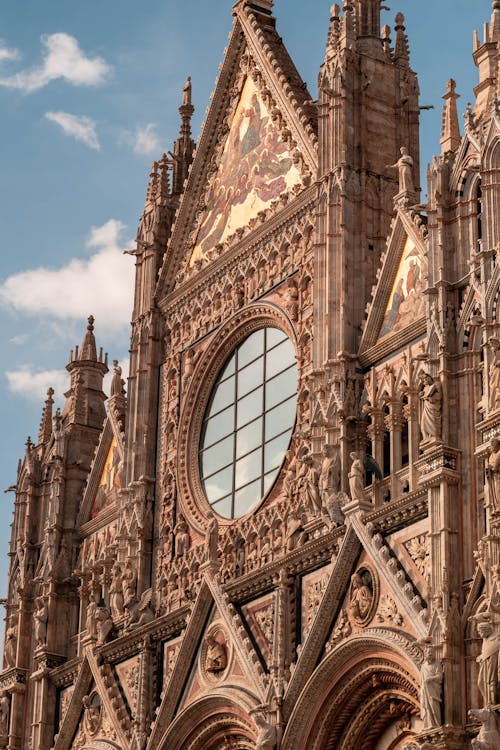 The facade of a cathedral with a clock