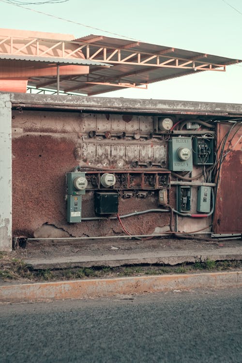 An old building with electrical equipment on it