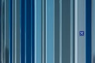 Board with Spoon and Fork on Wall