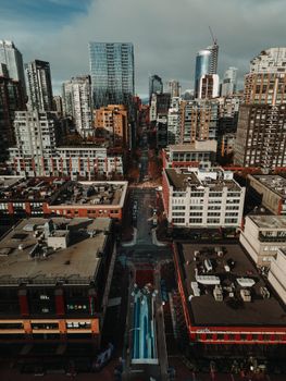 Explore an urban aerial view of downtown Vancouver's skyline and streets.