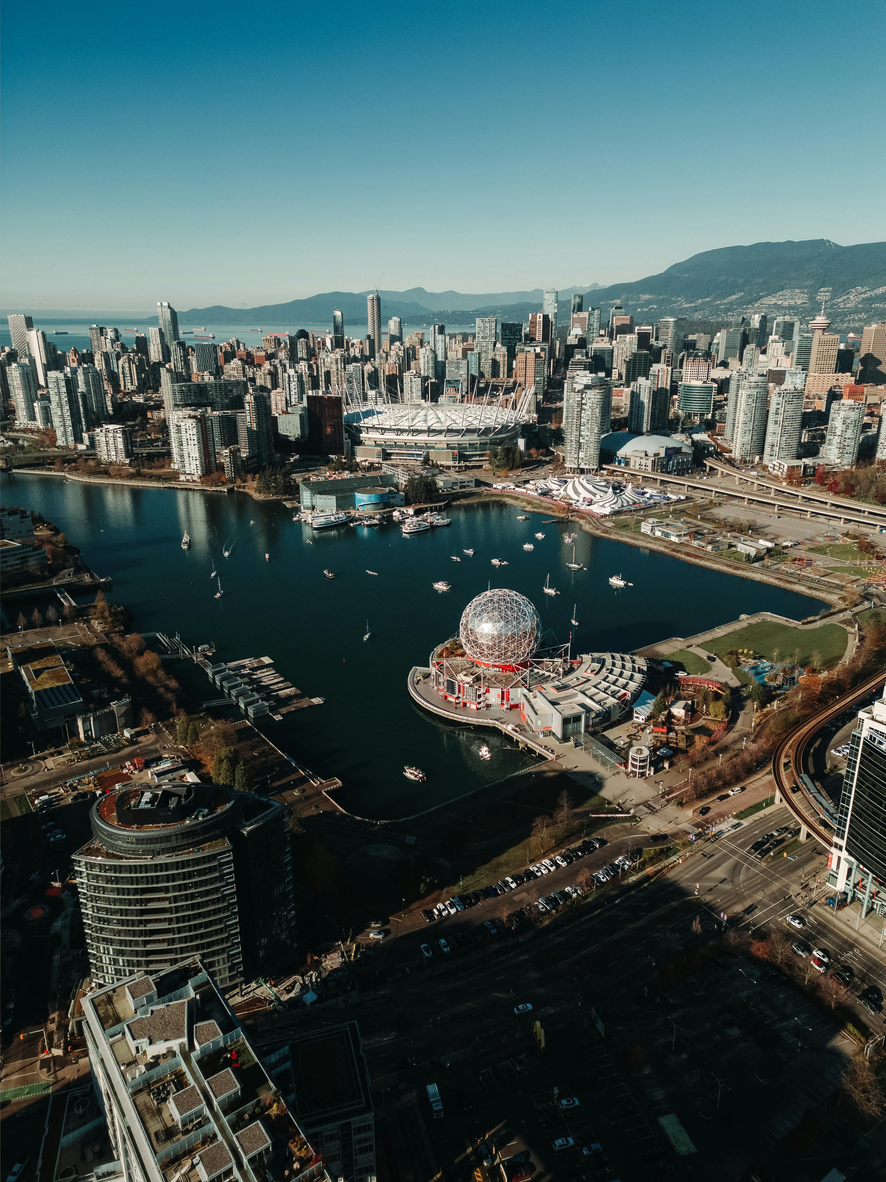 Stunning aerial view of Vancouver BC skyline featuring Science World and False Creek.