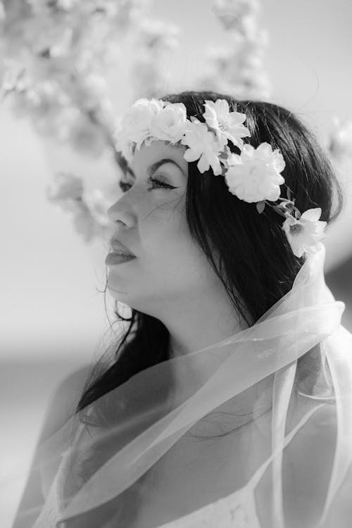 Black and white photo of bride wearing flower crown