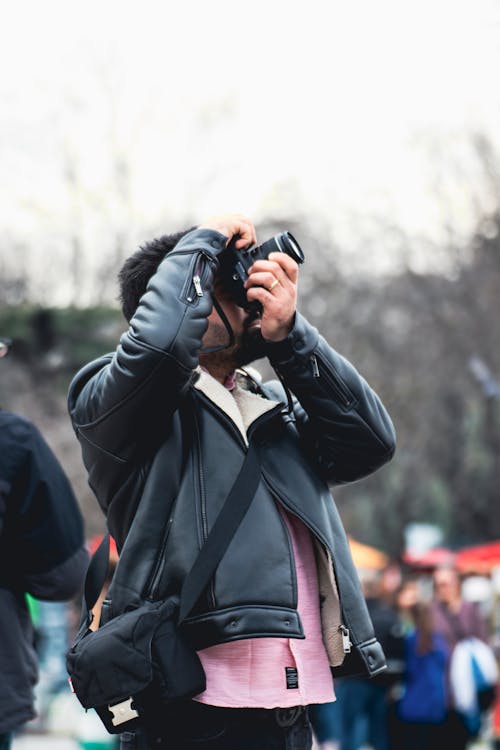 A man taking a picture of a crowd