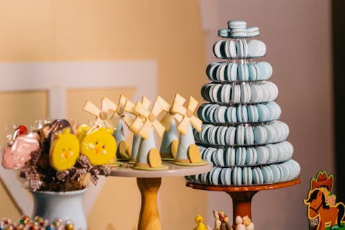 A table with a variety of macarons and cookies