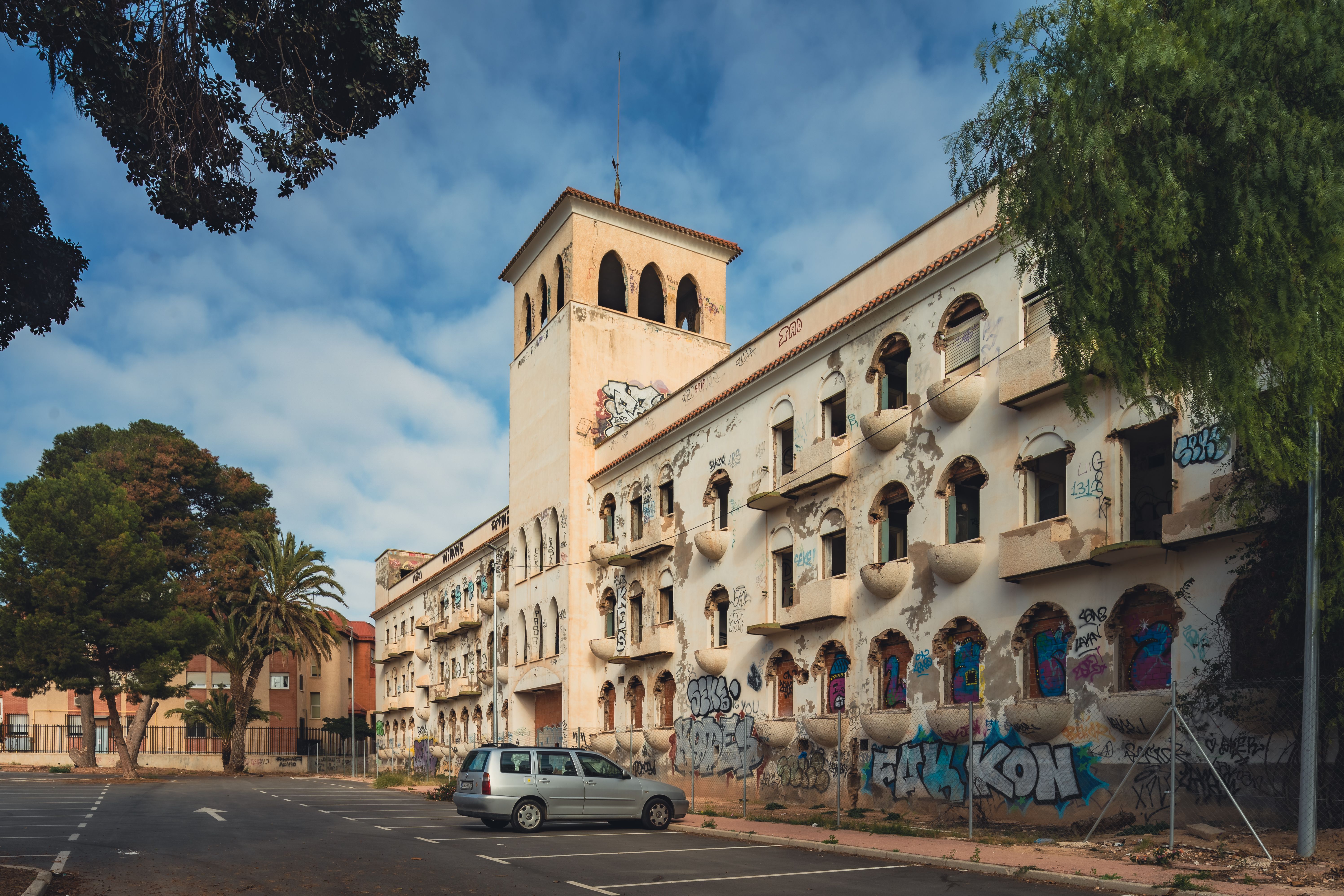 Explore the decay and urban art of an abandoned building in San Javier, Spain.
