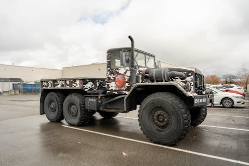 A military truck with a camouflage paint job