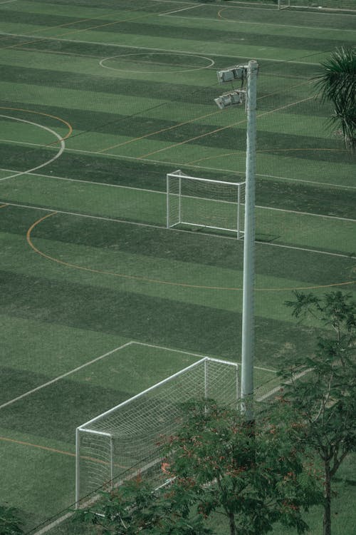 A soccer field with a goal and a goal post