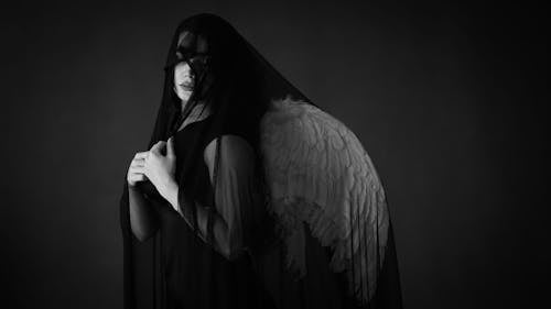 Foto profissional grátis de anjo, asas, assustador