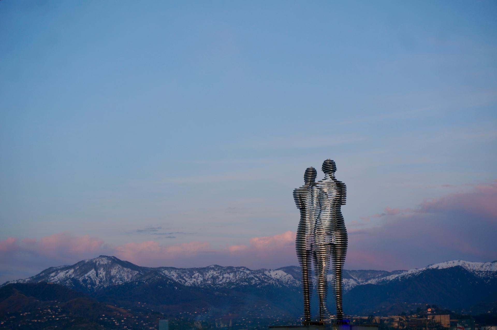 A beautiful view of the Ali and Nino sculpture during sunset in Batumi, Georgia.