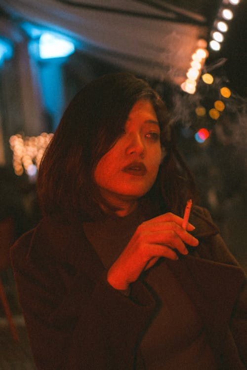Portrait of Woman Smoking a Cigarette 