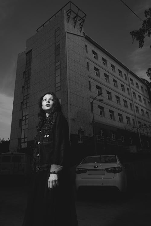 Woman Standing Near Car