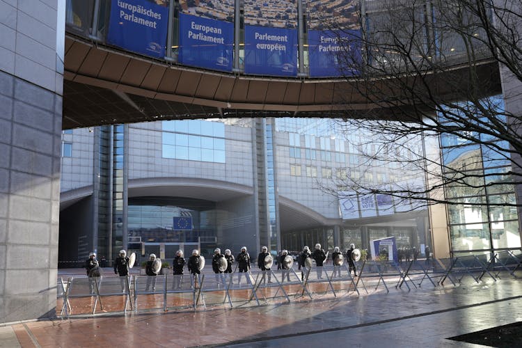 Police Defending European Parliament On Protest