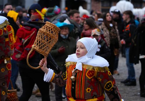 A colorful scene from Binche Carnival, showcasing traditional costumes.