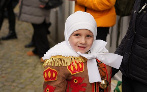 A Boy in a Costume at the Carnival of Binche in Belgium 