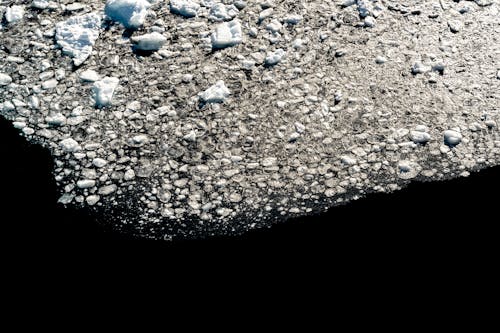 A close up of ice and snow on the ocean