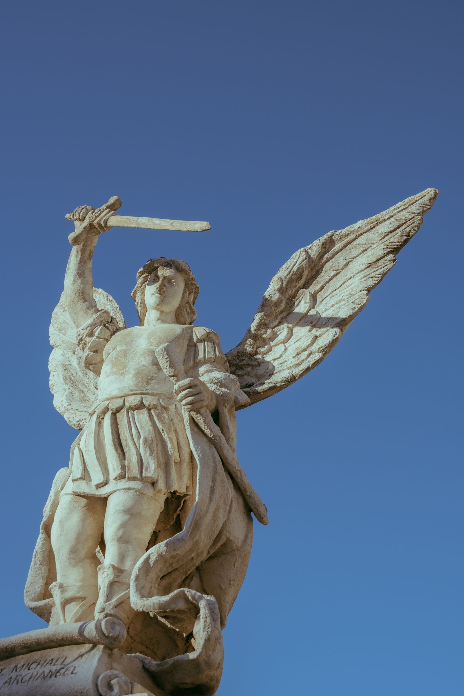 Dramatic Statue of Archangel Michael in Lourdes, France · Free Stock Photo