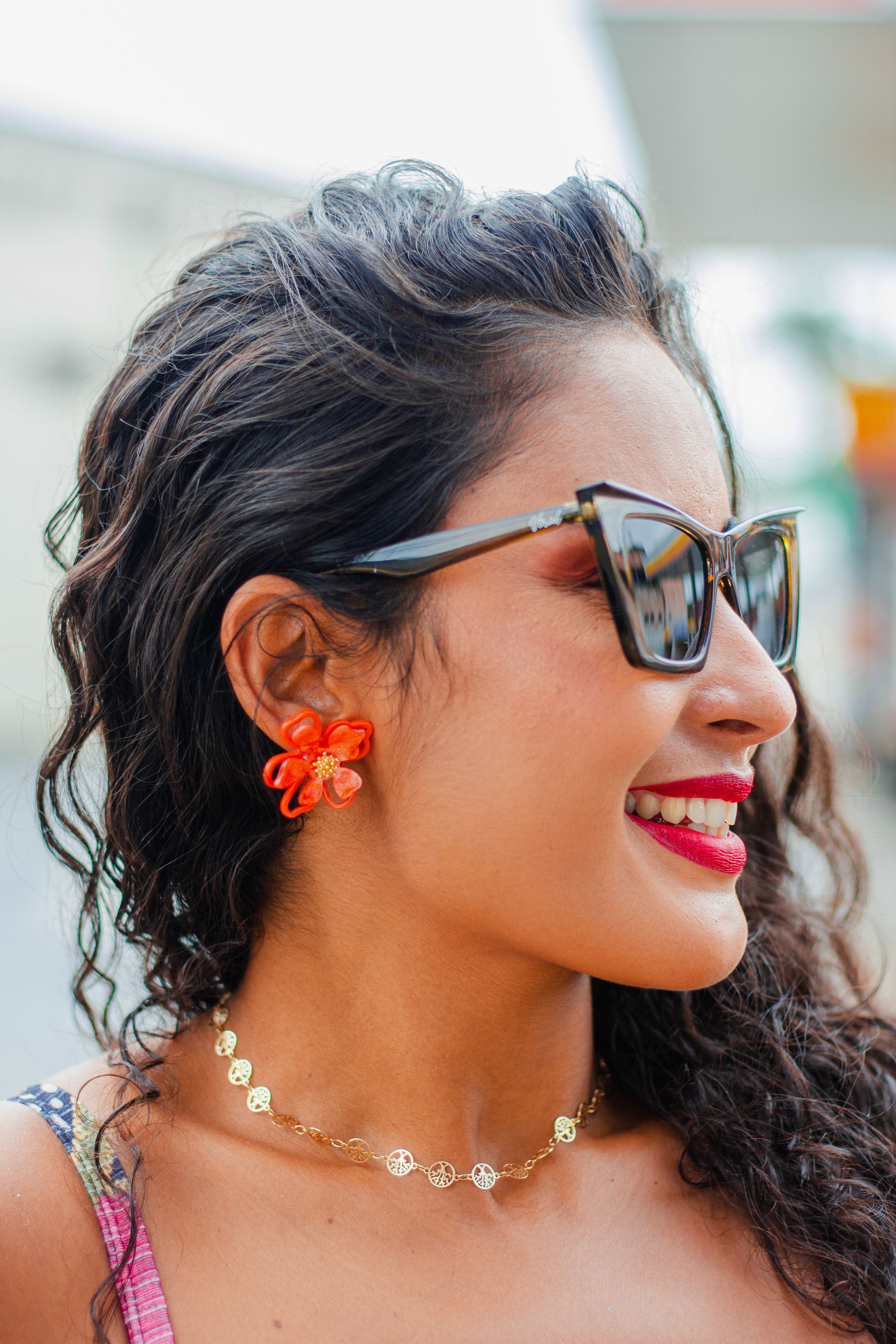 Portrait of a Young Woman Wearing Sunglasses · Free Stock Photo