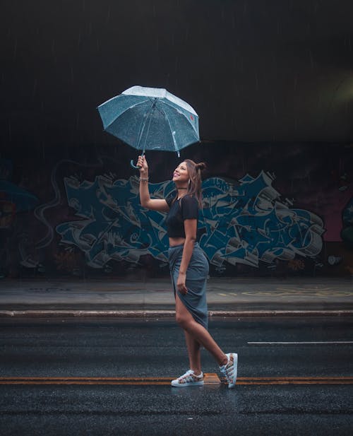 Woman Holding Transparent Umbrella